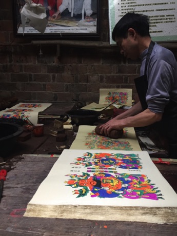 Printer at Tantau: hand-printing Door Guardian prints (about 100 per hour)